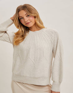 CREW NECK CABLE KNIT SWEATER