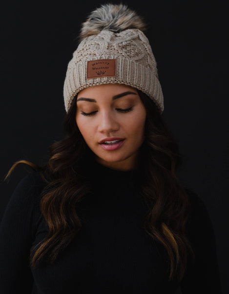 Tan Cable Knit Pom Hat w/ Whiskey Weather Patch